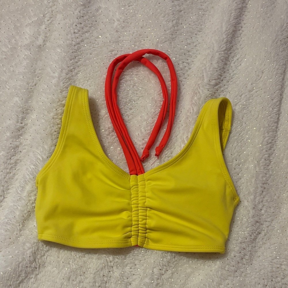 Yellow and coral sports bra five the label